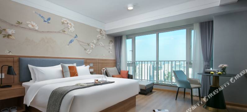 五月精品酒店(信阳东站恒大广场店)图片