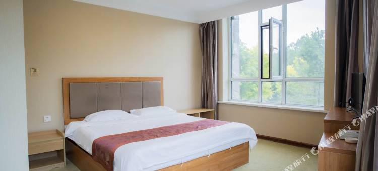 茗阳·宿温Suenn商务度假宾馆(长白山美人松雕塑公园店)图片