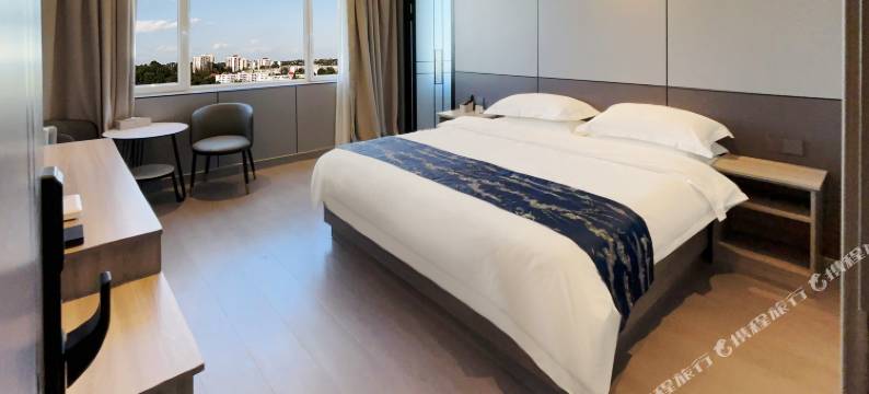 合作雄红酒店图片