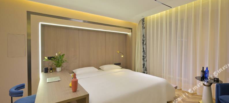 蓝迪酒店(国际会展中心小草公园店)图片