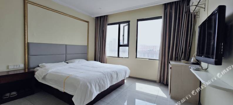 OYO广源商务宾馆(信阳火车站天润广场店)图片