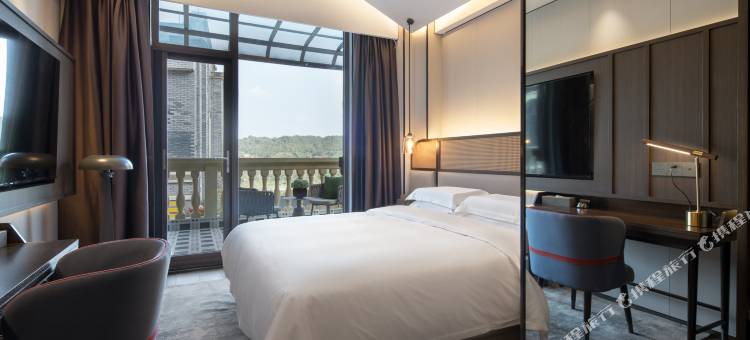 栖尘酒店(屏山县3A体育公园马湖公园店)图片