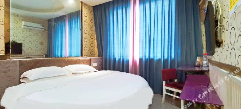 金华尚婕时尚宾馆(金华职业技术学院新农贸交易点店)图片