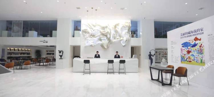 威海天和美术馆酒店(葡萄滩海水浴场店)图片