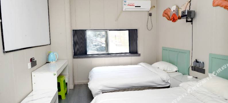 尊客居商务酒店(青岛小麦岛公园青岛大学店)图片