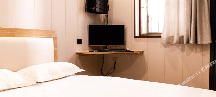 易佰良品酒店(武陟红旗路兴华家电店)图片