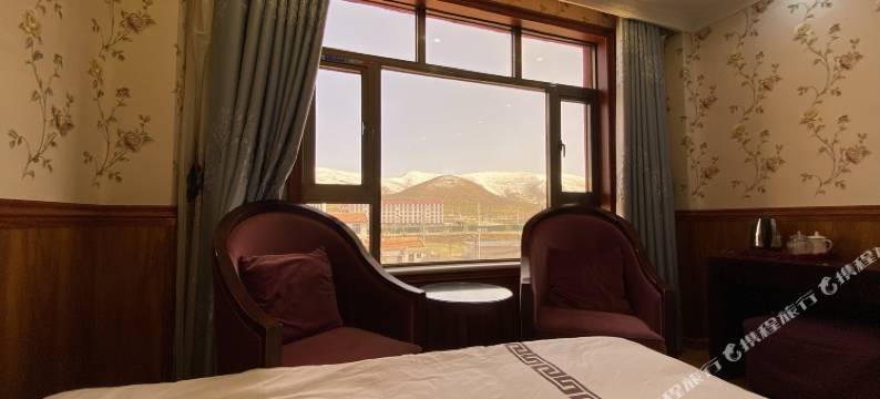 久治玖月商务酒店图片