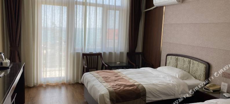 中原油田威海绿岛宾馆(半月湾店)图片