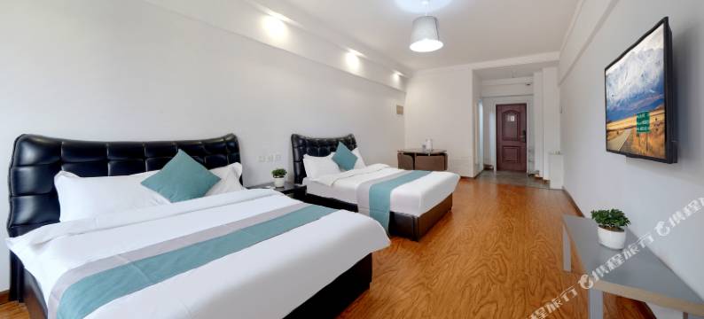 悦冠影音公寓(哈尔滨哈西高铁站万达广场店)图片