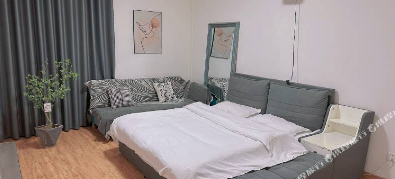 青岛浪漫e家公寓图片