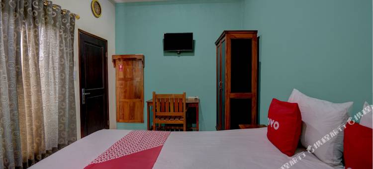 Hotel O 沙哈巴特伊斯兰旅馆靠近普拉萨电信巴威安(Hotel O Sahabat Syariah Near Plasa Telkom Bawean)图片