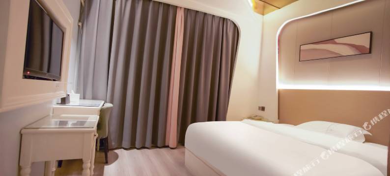 沐曼优酒店(金华世贸城市广场店)图片