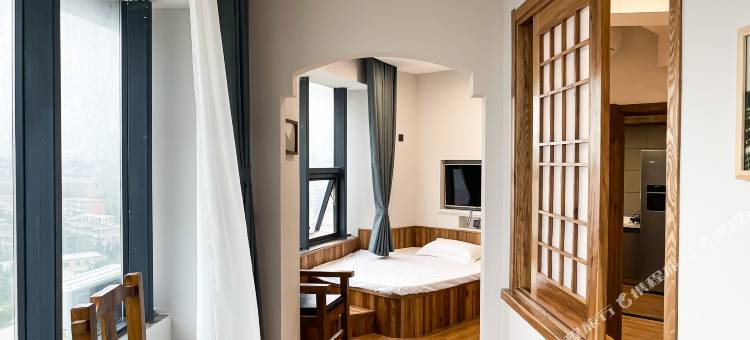 源里酒店公寓(兴海南街店)图片