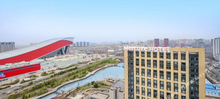 哈尔滨松北美居酒店图片