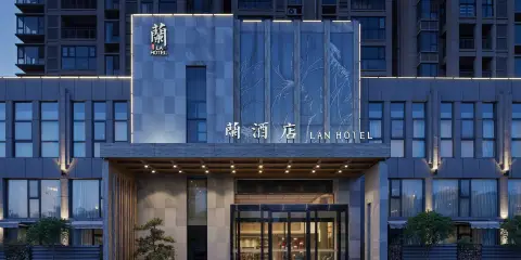 信陽蘭酒店(市政府羊山外國語小學店)