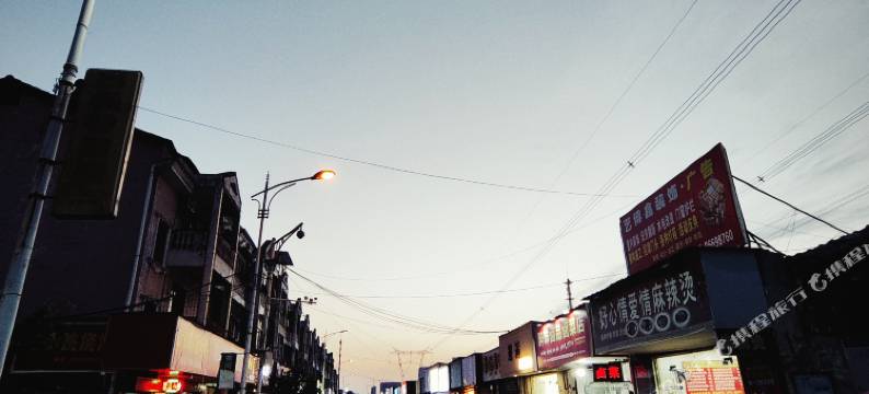 新港旅店(武汉纺织大学阳光校区江夏一中店)图片