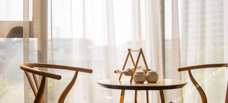 沁颐酒店(绍兴柯桥银泰百货中国轻纺城地铁站店)图片