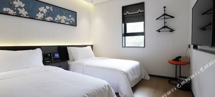 白玉兰酒店(绵阳七星楼高铁站店)图片