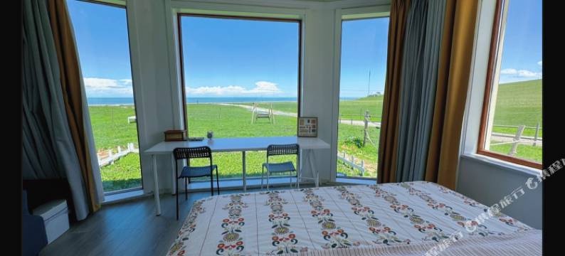 青海湖混序白房子民宿图片