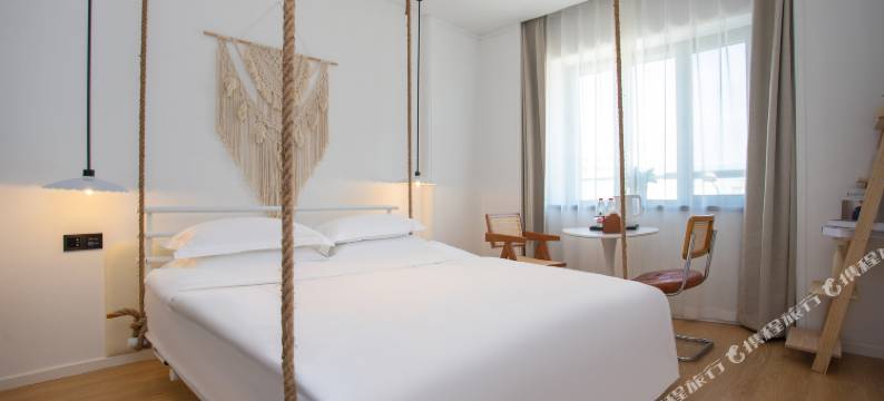 小城顾氏精品文化酒店(长春火车站西安桥轻轨站店)图片