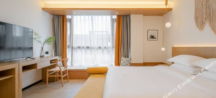 木朴一隅民宿(海口美兰机场鸿洲江山店)图片