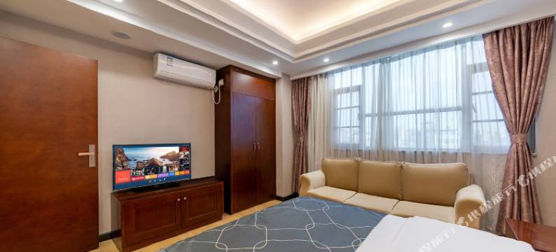 德洲酒店(广州平沙外语外贸学校店)图片