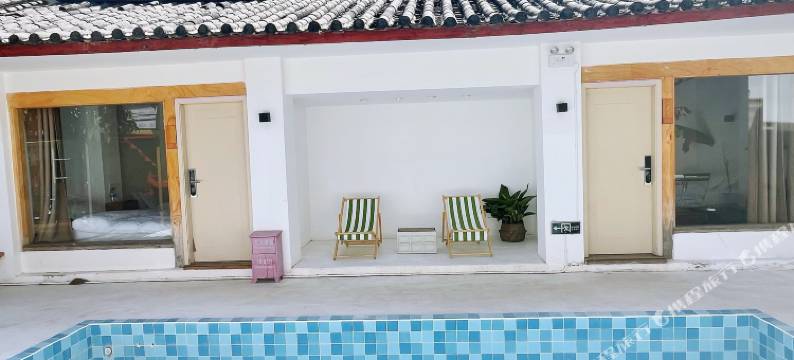 玉龙等风民宿图片