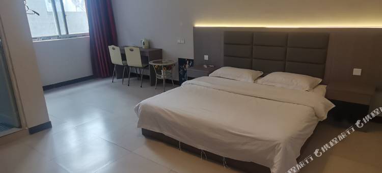 OYO新郑莱湾宾馆(河南工程学院店)图片