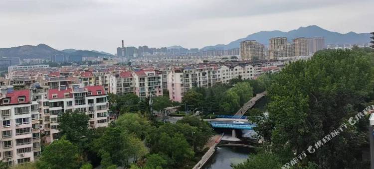 桃花源酒店(青岛北站君峰路地铁站店)图片