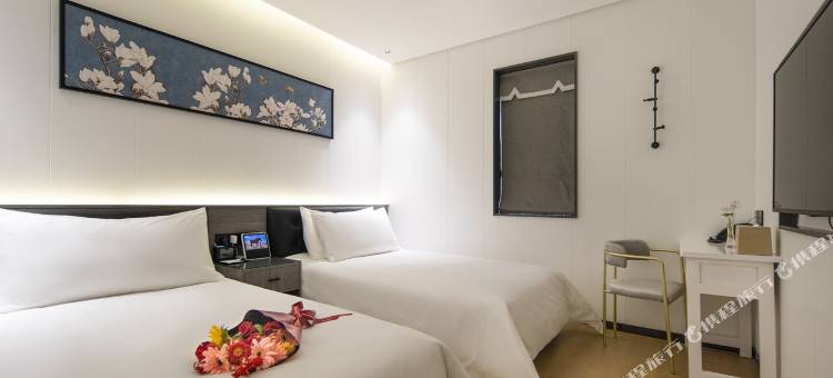 白玉兰酒店(绵阳七星楼高铁站店)图片