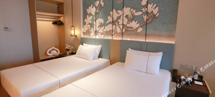 白玉兰酒店(成都海峡茶城三河场地铁站店)图片