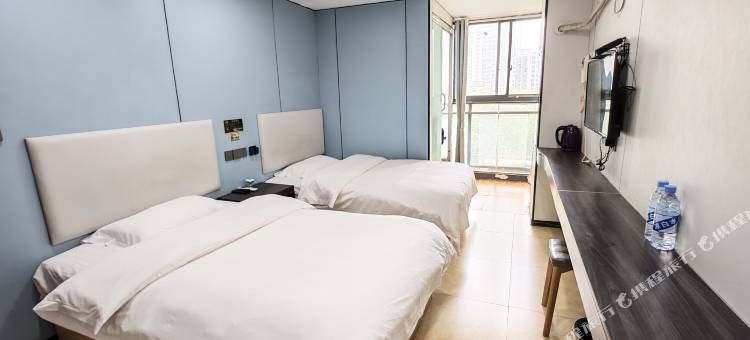 武汉鑫鑫宾馆(东吴大道轻轨站店)图片