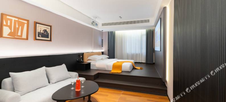 沐光逸居•SUN KISSED EASED•墨韵雅奢设计师酒店(汕头高铁站店)图片