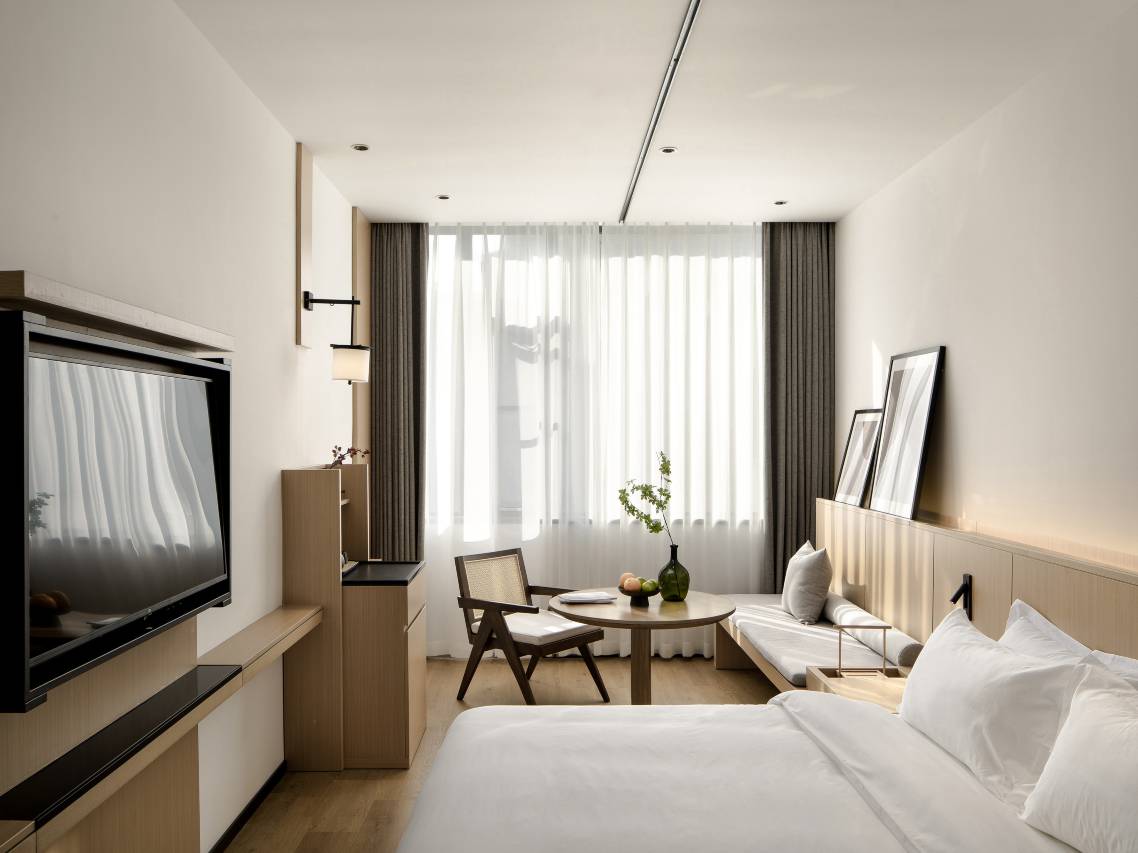 SFEEL设计师酒店(乐山张公桥美食街店)图片