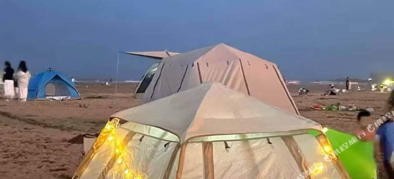 破晓观海日出海边露营民宿图片