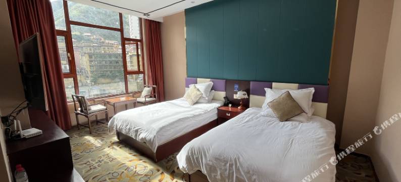 新龙圣洁梁茹酒店图片