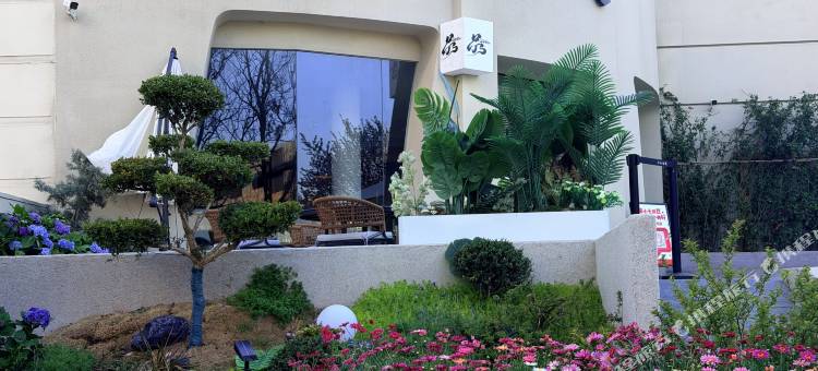 柒川酒店(石老人海水浴场会展中心地铁站店)图片