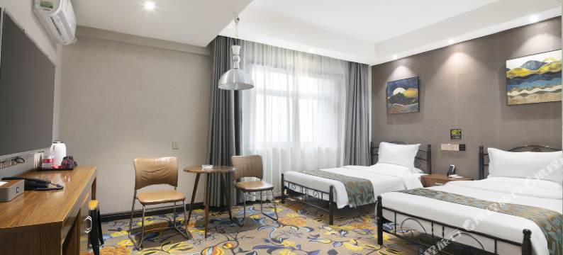 新密麒麟商务酒店(桥头夜市店)图片