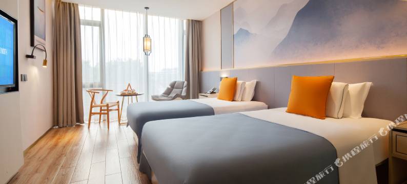 沁颐酒店(绍兴柯桥银泰百货中国轻纺城地铁站店)图片