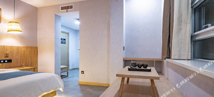 桃花源酒店(米东吾悦广场贡米巷店)图片