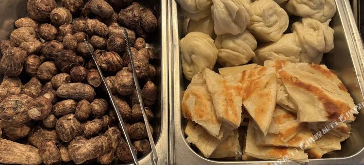 曼卡金苹果酒店(费县东方购物广场店)图片