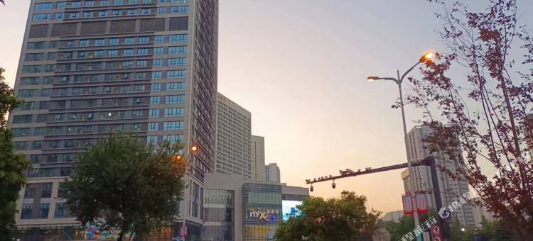 酷客时尚影视民宿(三桥地铁站汉唐新都汇店)图片