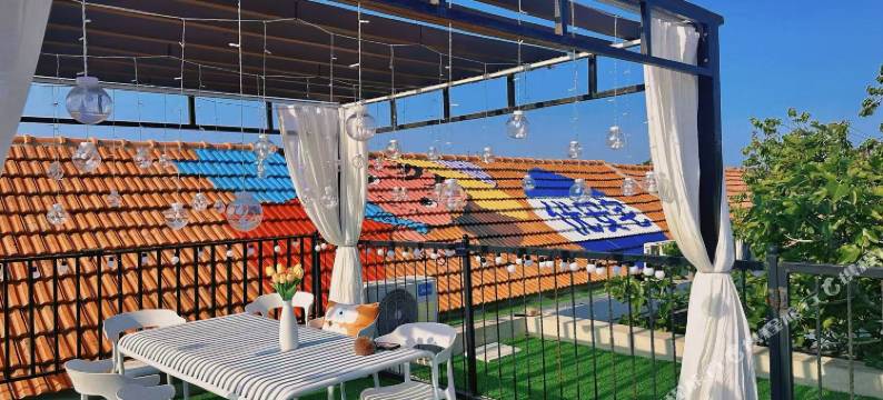 烟台优安宅民宿(养马岛海水浴场店)图片