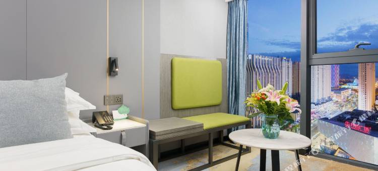 悦享·轻居酒店(经开万达广场高铁站店)图片