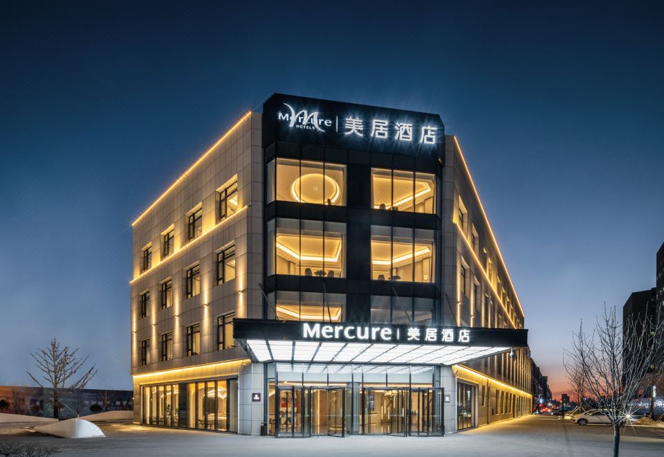 长春欣城美居酒店外景图
