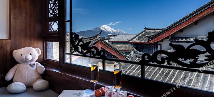 日照金山·心飞扬观景纳西美宿图片