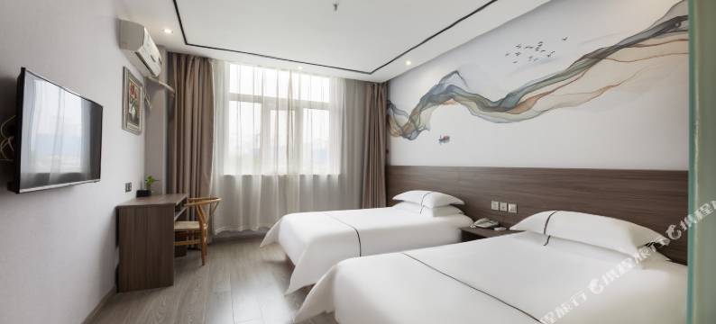 美宜家连锁酒店(新乡新区市政府店)图片