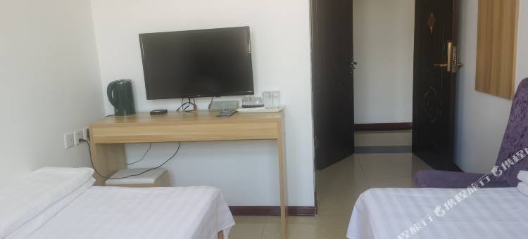 根河市满归镇暖冬宾馆图片