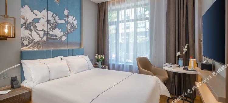 白玉兰酒店(上海新华医院江浦路地铁站店)图片