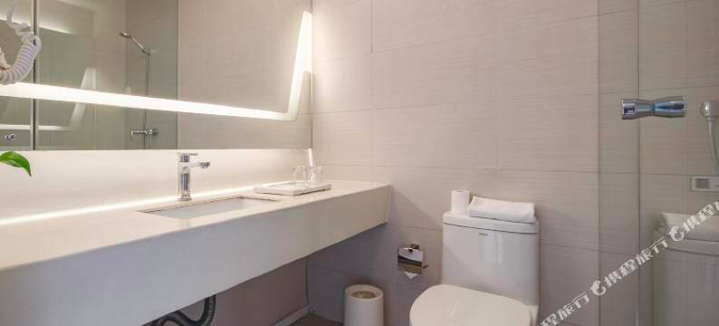 东伍·拾捌酒店(天津市滨海国际机场肿瘤医院空港医院店)图片